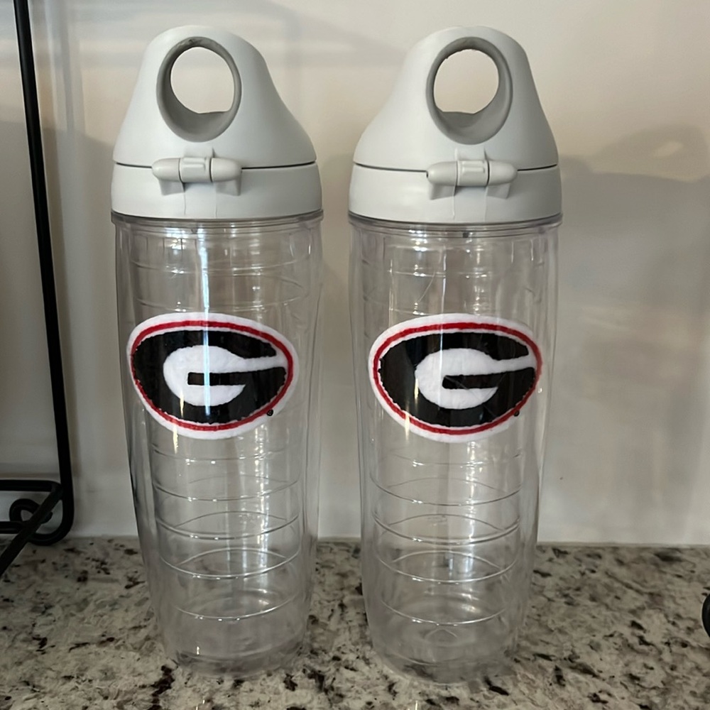 Two university of Georgia, 24 ounce cups with covers.  Tervis